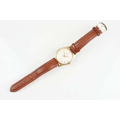 507 - Garrard gold plated wrist watch having a cream dial with arabic numerals to the chapter ring and sub... 