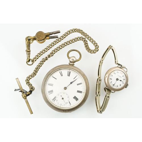 512 - Victorian silver open faced pocket watch having a white dial with roman numerals to the chapter ring... 