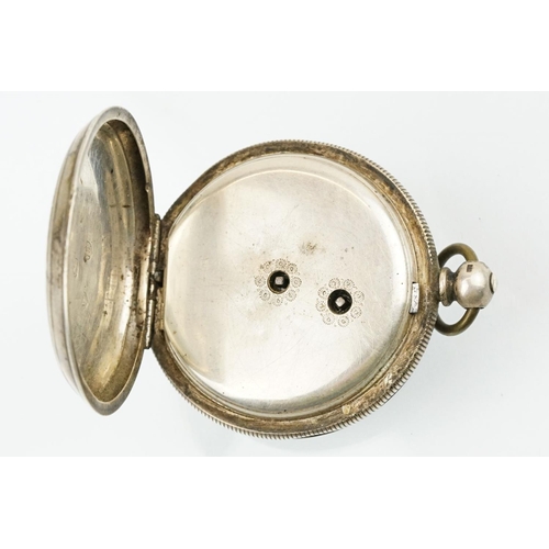 512 - Victorian silver open faced pocket watch having a white dial with roman numerals to the chapter ring... 