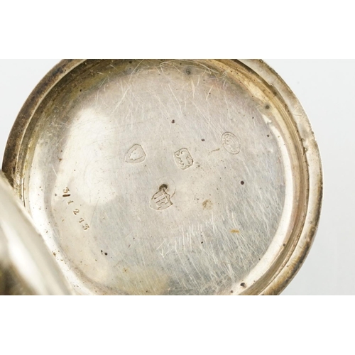 512 - Victorian silver open faced pocket watch having a white dial with roman numerals to the chapter ring... 