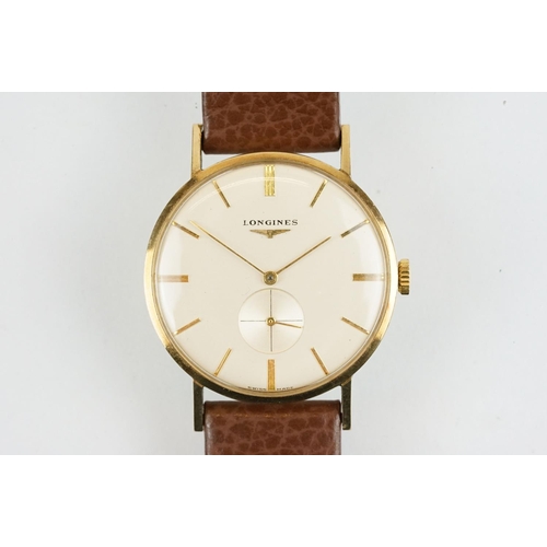 517 - Longines gentlemen's 9ct gold wrist watch having a cream dial, baton numerals to the chapter ring an... 