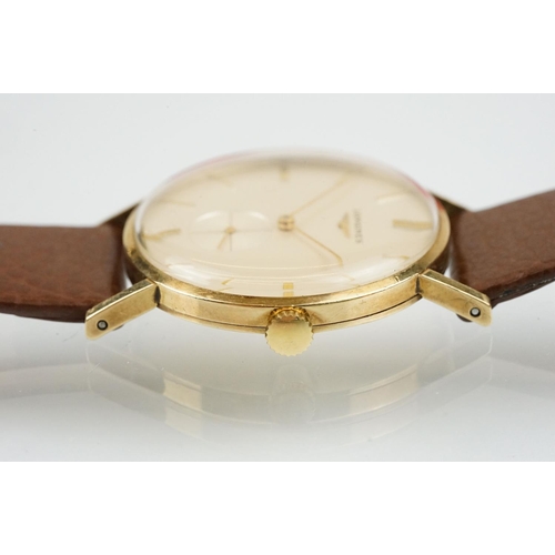 517 - Longines gentlemen's 9ct gold wrist watch having a cream dial, baton numerals to the chapter ring an... 