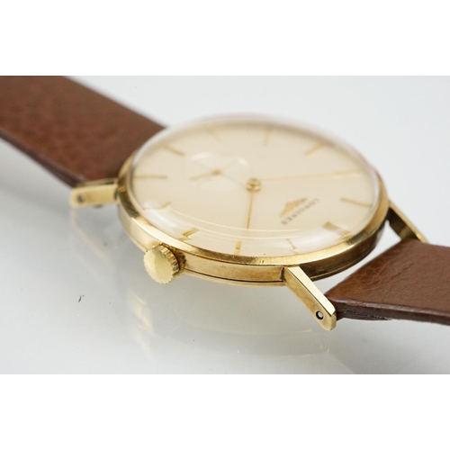 517 - Longines gentlemen's 9ct gold wrist watch having a cream dial, baton numerals to the chapter ring an... 