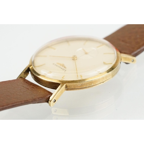 517 - Longines gentlemen's 9ct gold wrist watch having a cream dial, baton numerals to the chapter ring an... 