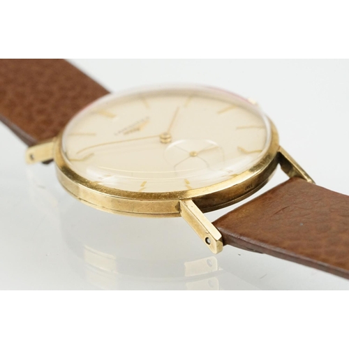 517 - Longines gentlemen's 9ct gold wrist watch having a cream dial, baton numerals to the chapter ring an... 