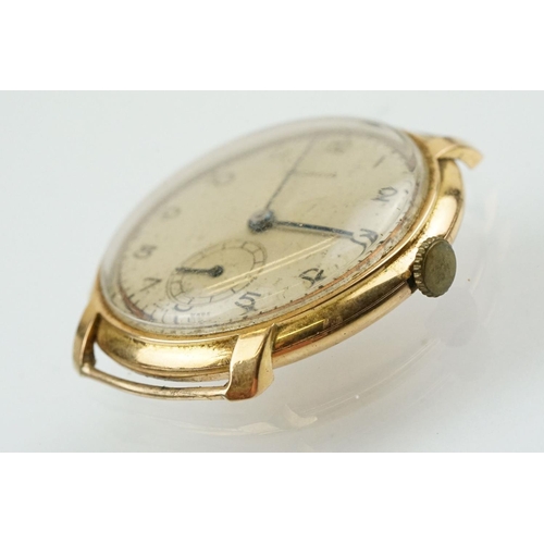 518 - Art Deco Rolex 9ct gold wrist watch having a silvered dial with arabic numerals to the chapter ring,... 