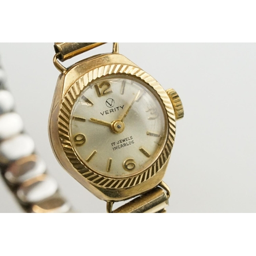 520 - 9ctr gold cased verity cocktail watch having a silvered face and expandable bracelet strap. Case mar... 