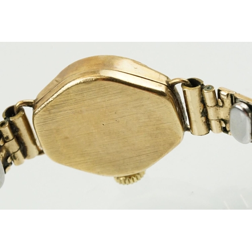 520 - 9ctr gold cased verity cocktail watch having a silvered face and expandable bracelet strap. Case mar... 