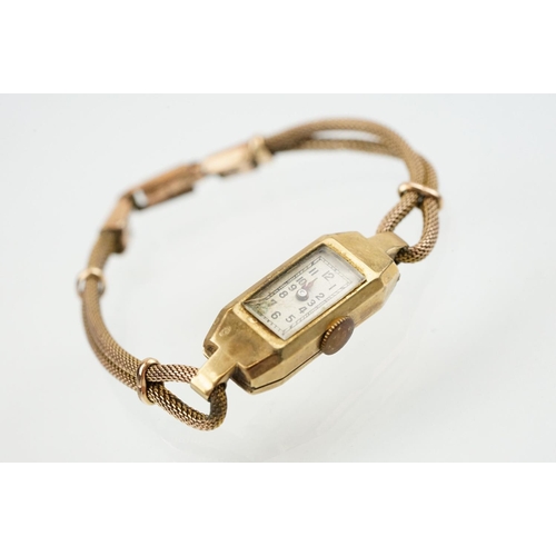 526 - Art Deco 9ct gold dress watch having a rectangular face with arabic numerals to the chapter ring, se... 