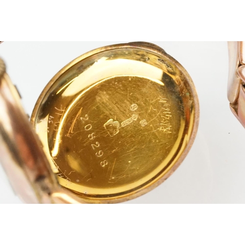 527 - Early 20th Century 9ct gold hallmarked wrist watch. The watch having a round white enamelled face wi... 