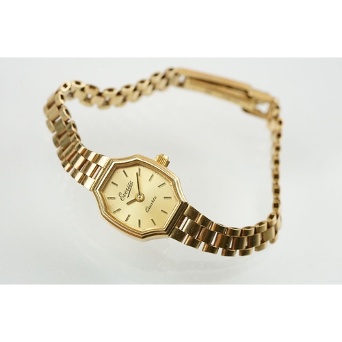 528 - Ladies Everite 9ctr gold wrist watch having a canted rectangular dial with baton markers to the chap... 