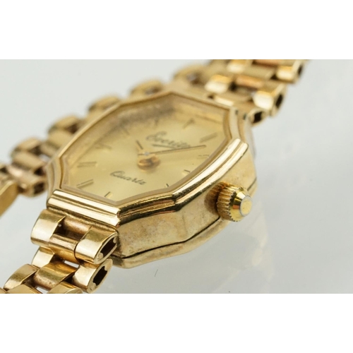 528 - Ladies Everite 9ctr gold wrist watch having a canted rectangular dial with baton markers to the chap... 