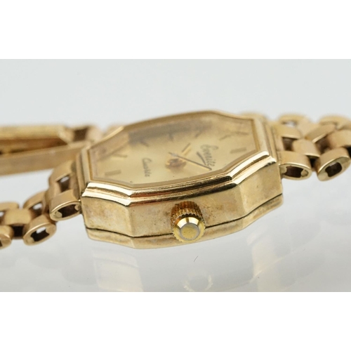 528 - Ladies Everite 9ctr gold wrist watch having a canted rectangular dial with baton markers to the chap... 