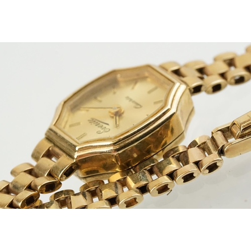 528 - Ladies Everite 9ctr gold wrist watch having a canted rectangular dial with baton markers to the chap... 