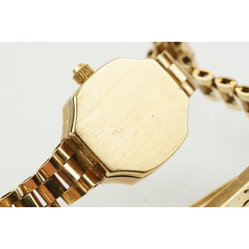 528 - Ladies Everite 9ctr gold wrist watch having a canted rectangular dial with baton markers to the chap... 