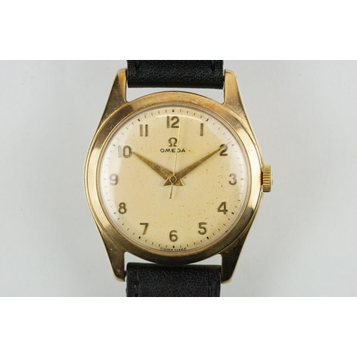 529 - Vintage mid 20th Century Omega 9ct gold cased gentleman's wrist watch. The watch having a round dial... 