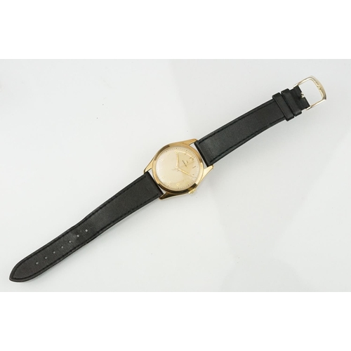 529 - Vintage mid 20th Century Omega 9ct gold cased gentleman's wrist watch. The watch having a round dial... 