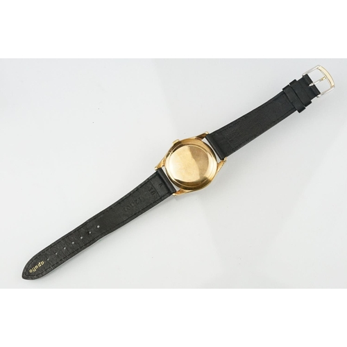 529 - Vintage mid 20th Century Omega 9ct gold cased gentleman's wrist watch. The watch having a round dial... 