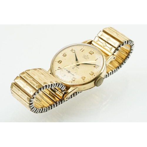 531 - Smiths De Luxe 9ct gold cased gentlemen's wrist watch having a round face with arabic numerals to th... 