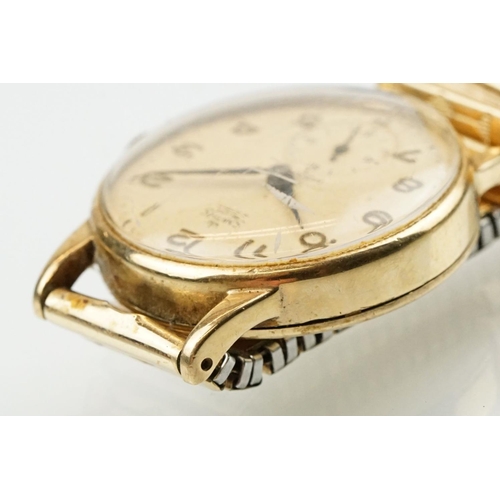 531 - Smiths De Luxe 9ct gold cased gentlemen's wrist watch having a round face with arabic numerals to th... 