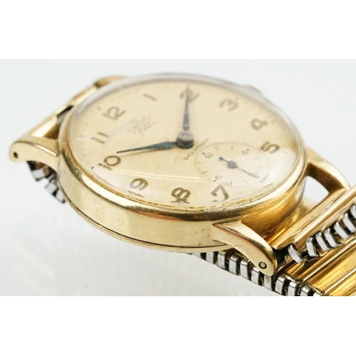 531 - Smiths De Luxe 9ct gold cased gentlemen's wrist watch having a round face with arabic numerals to th... 