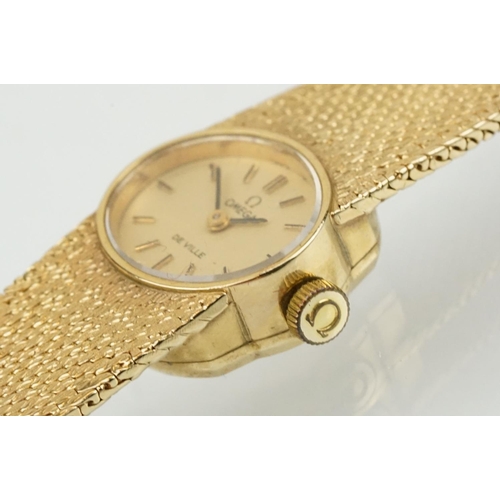 532 - Omega De Ville 9ct gold ladies cocktail watch having an oval face with baton markers to the chapter ... 