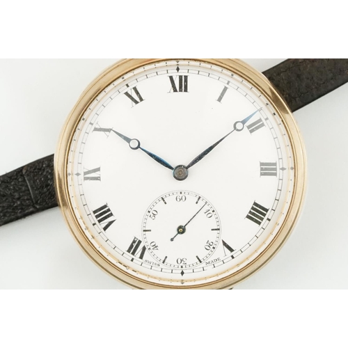 534 - 1930s 9ct gold open face pocket watch. The watch having a white enamelled face with roman numerals t... 