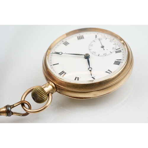 534 - 1930s 9ct gold open face pocket watch. The watch having a white enamelled face with roman numerals t... 