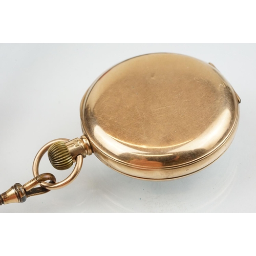 534 - 1930s 9ct gold open face pocket watch. The watch having a white enamelled face with roman numerals t... 