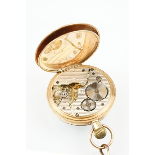 534 - 1930s 9ct gold open face pocket watch. The watch having a white enamelled face with roman numerals t... 