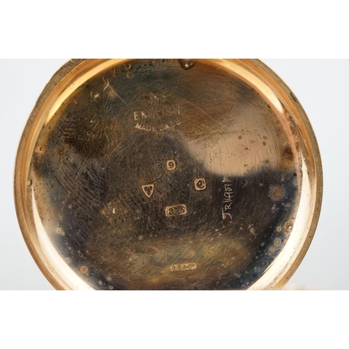 534 - 1930s 9ct gold open face pocket watch. The watch having a white enamelled face with roman numerals t... 