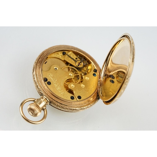 539 - Elgin gold plated full hunter pocket watch having a round white enamelled face with roman numerals t... 