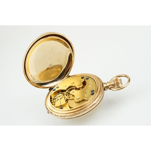 539 - Elgin gold plated full hunter pocket watch having a round white enamelled face with roman numerals t... 