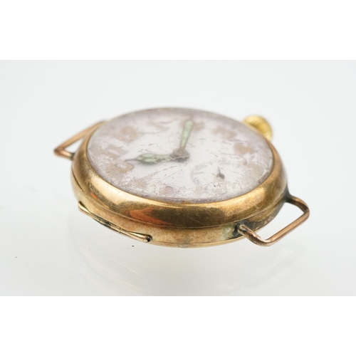 540 - Art Deco 9ct gold wrist watch having a white enamelled face with arabic numerals to the chapter ring... 