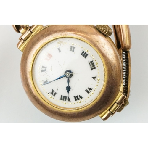 541 - Four gold cased wrist watches to include a red cord watch with 9ct case and strap, a 15ct gold gilt ... 