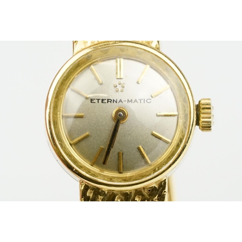 542 - 18ct gold ladies Eterna-matic 18ct gold cocktail wrist watch having a round face with baton markers ... 