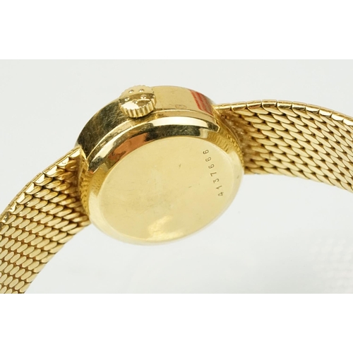 542 - 18ct gold ladies Eterna-matic 18ct gold cocktail wrist watch having a round face with baton markers ... 