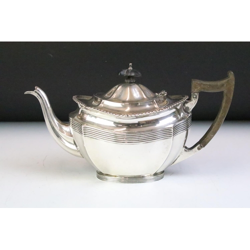 550 - Early 20th Century four piece silver hallmarked tea set to include tea pot, twin handled sugar bowl,... 