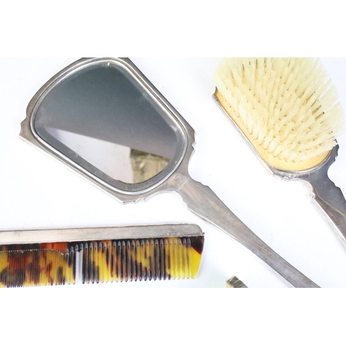 579 - Mid 20th Century Mappin & Webb silver hallmarked dressing table set to include hair brush, mirror, c... 