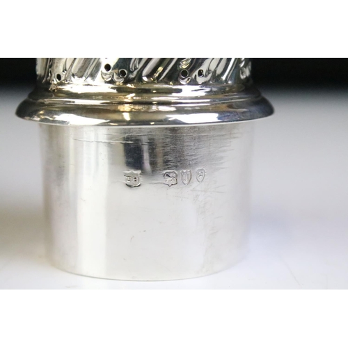 586 - 19th Century Victorian silver hallmarked sugar shaker of reeded baluster form with pierced lid. Hall... 