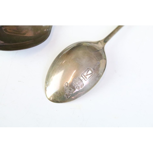 589 - Collection of silver spoons to include a haviland silver commemorative millennium spoon, two swan fi... 