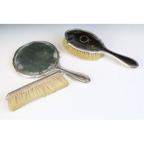 593 - Early 20th Century silver and tortoise shell dressing table set consisting of lidded jar, hair brush... 