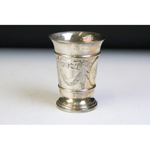 594 - Queen Elizabeth II silver jubilee silver hallmarked commemorative cup. The footed cup having moulded... 