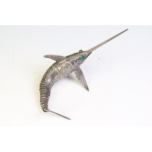 602 - Spanish silver model swordfish having an articulated body with green stone cabochon eyes. Pentagram ... 