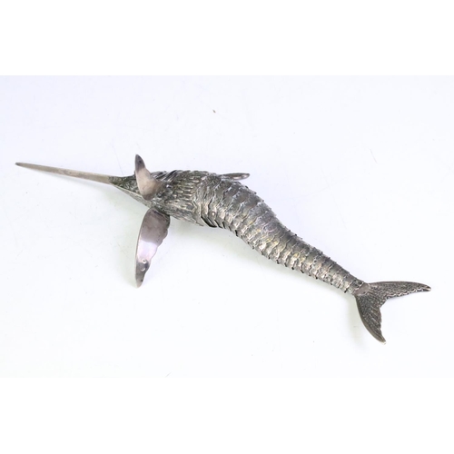 602 - Spanish silver model swordfish having an articulated body with green stone cabochon eyes. Pentagram ... 