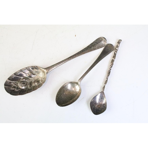 606 - 18th Century Georgian berry spoon having repousse fruit to the bowl and scrolled leaf detailing to t... 