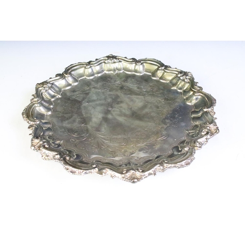 668 - 19th Century Victorian silver hallmarked salver having moulded scrolled detailing to the rim and eng... 