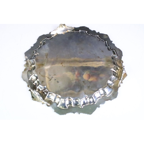 668 - 19th Century Victorian silver hallmarked salver having moulded scrolled detailing to the rim and eng... 