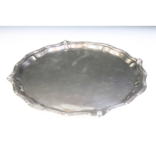 670 - Silver hallmarked salver tray having a pie crust border with moulded celtic detailing. Hallmarked Bi... 