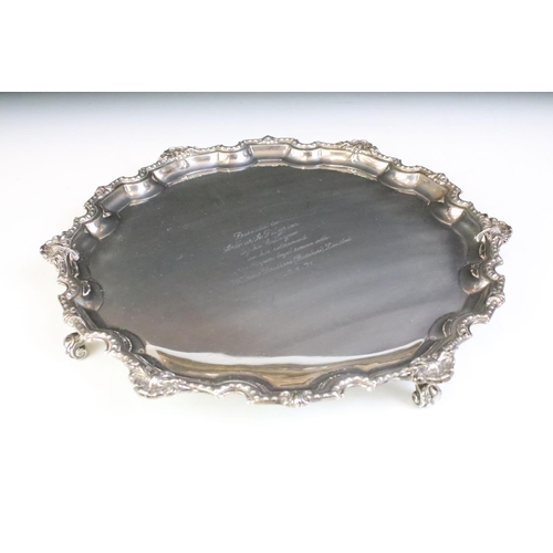 671 - 1960s Mappin & Webb silver hallmarked footed salver tray having a shell moulded rim raised on scroll... 